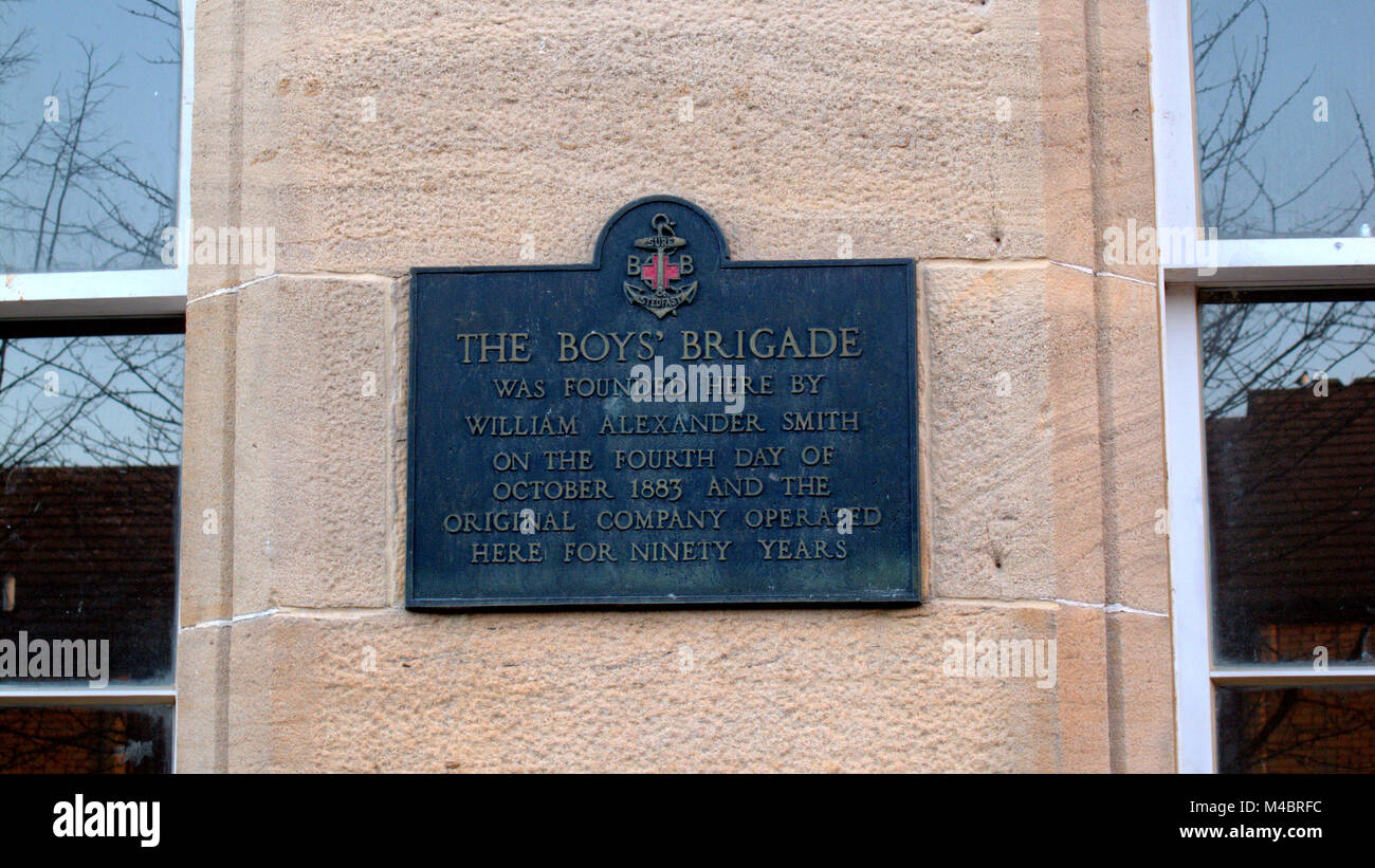 Boys Brigade Stiftung Plakette auf dem Gelände der ursprünglichen Firma gegründet 1883 an der Wand der Freien Kirche Mission Hall, North Woodside Road, Glasgow Stockfoto