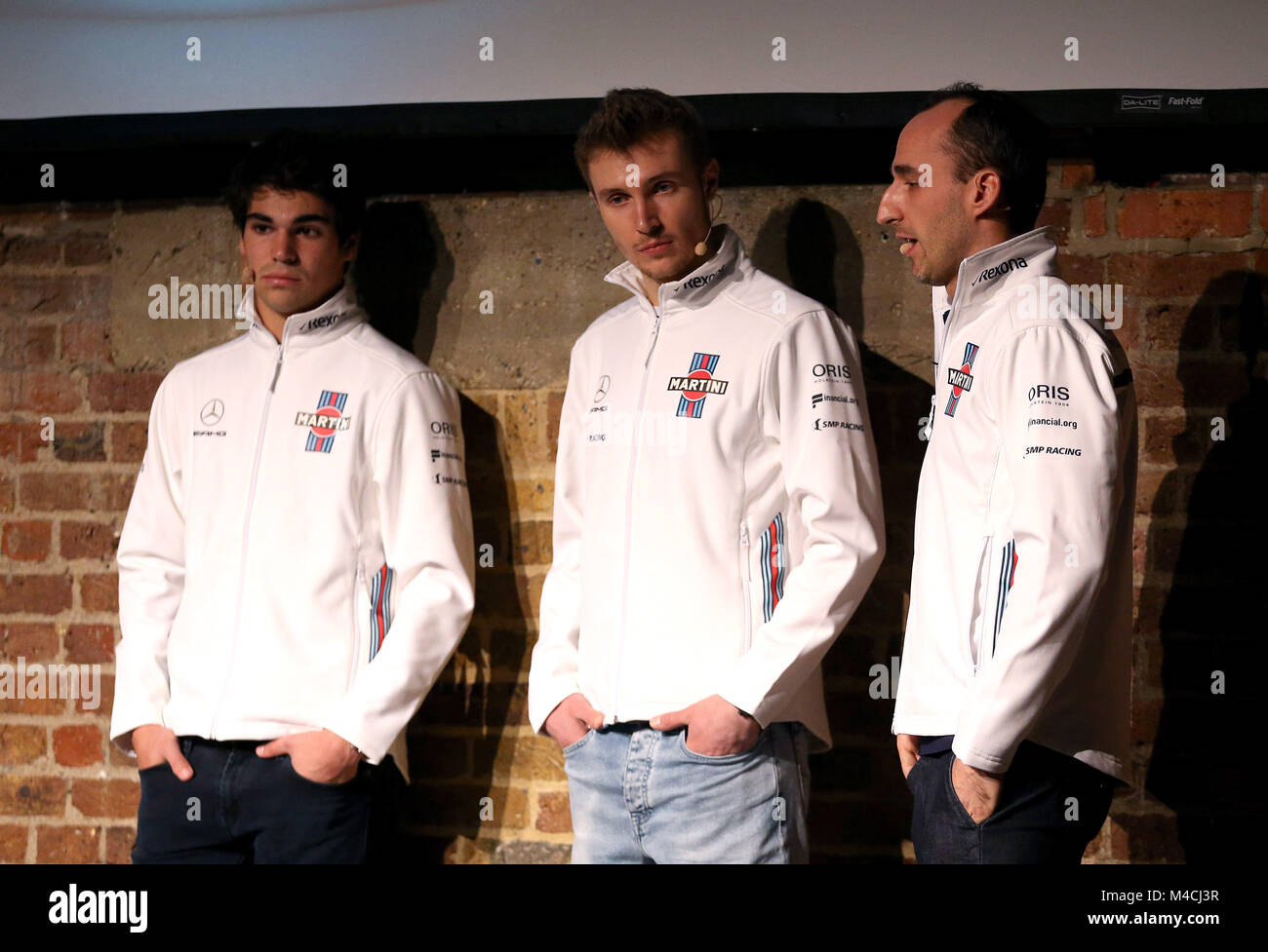 (Nach rechts) Treiber Lance Schlendern, Sergei Sirotkin und Robert Kubica finden und Entwicklung Treiber während der 2018 F1 Williams Auto Start auf der Dorf U-Bahn, London. Stockfoto