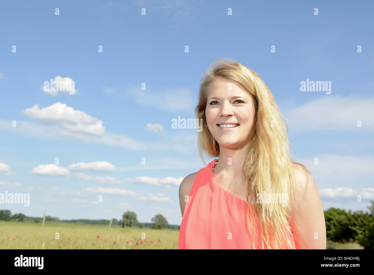 Glückliche junge Frau Stockfoto