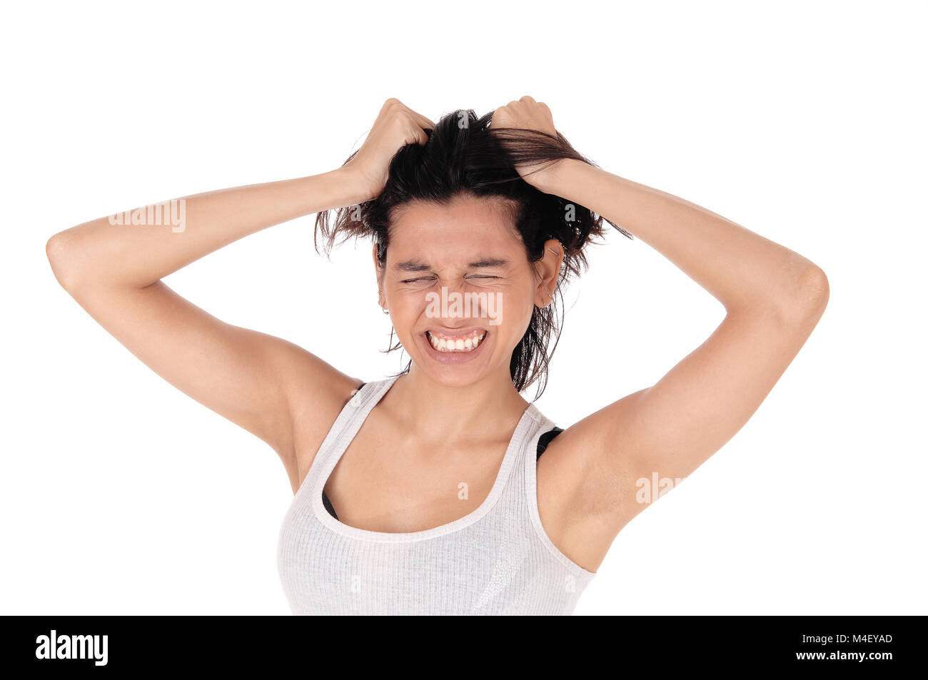 Wütende Frau ihre Haare durcheinander. Stockfoto