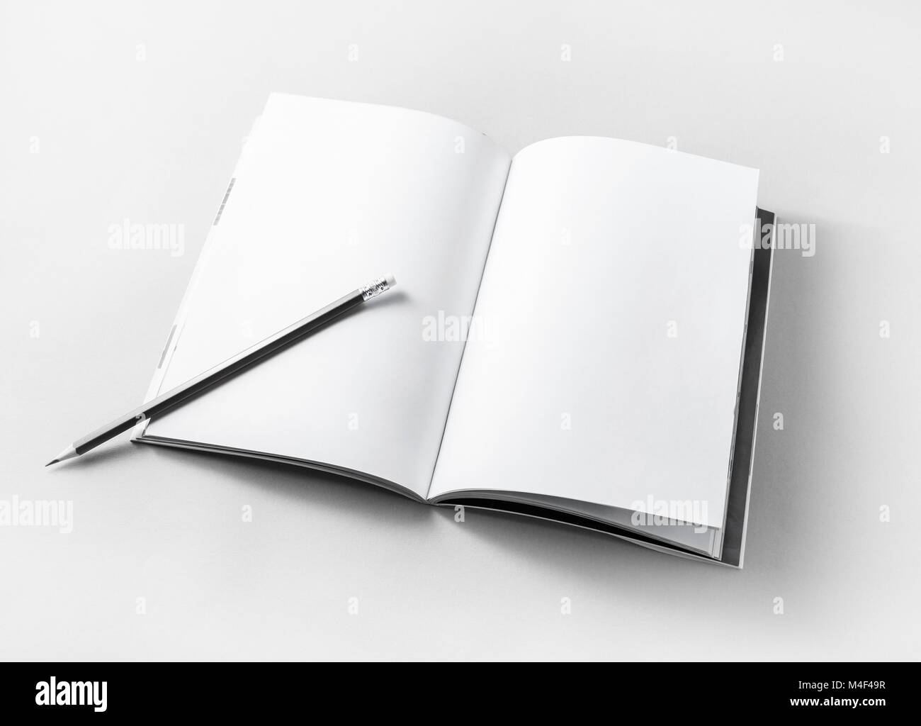 Buch und Stift Stockfoto