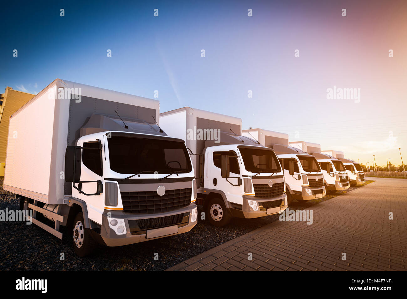 Flotte von kommerziellen Lkw auf Cargo parken Stockfoto