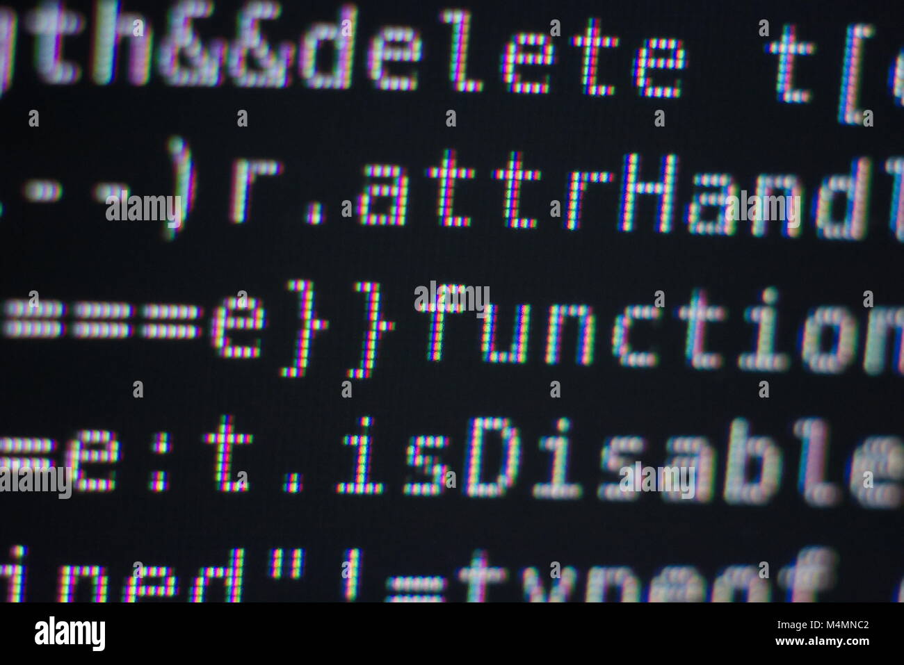 Weiß Programm Source Code-Segment auf einem schwarzen Bildschirm Makro Nahaufnahme Stockfoto