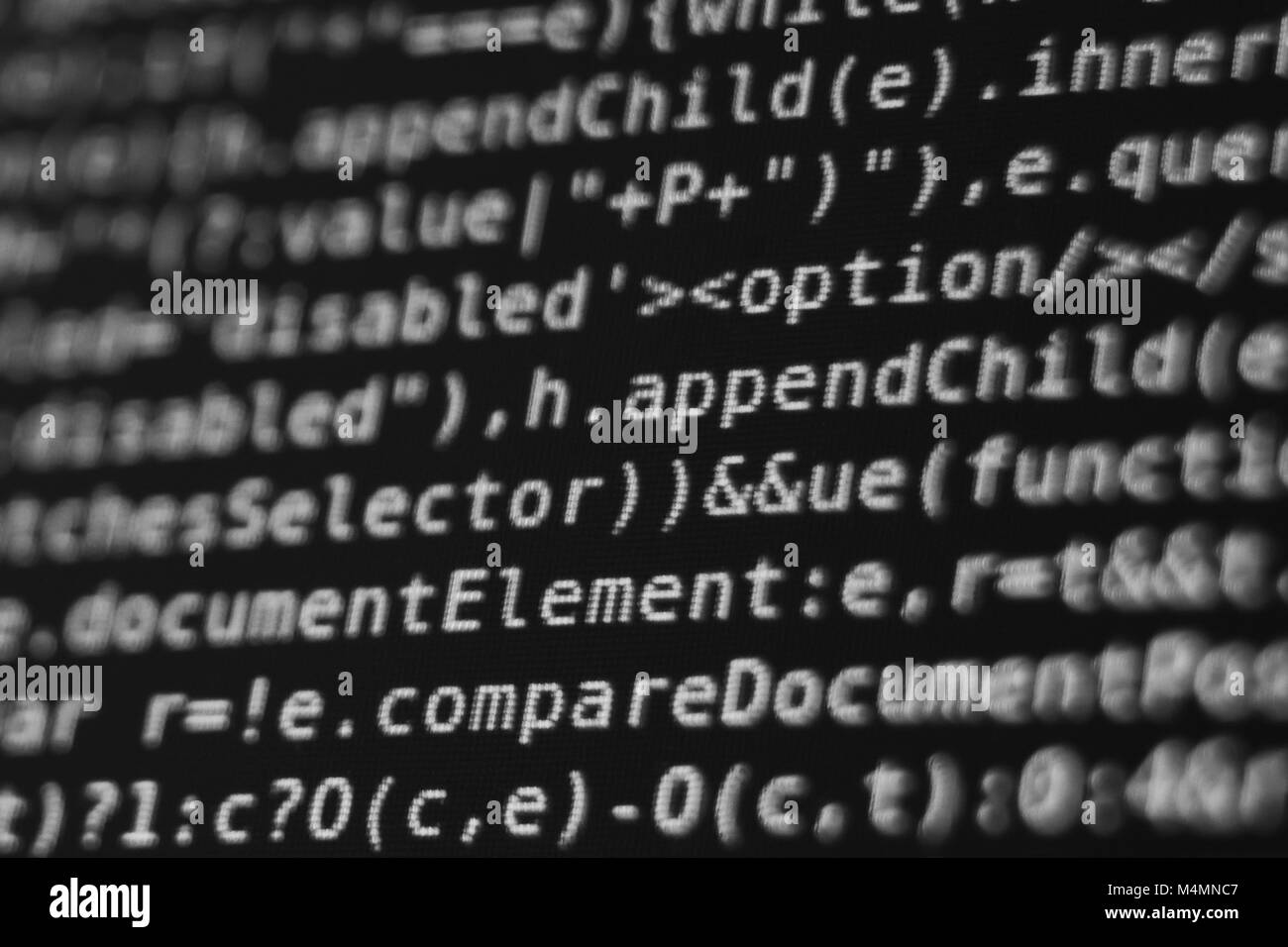 Weiß Programm Source Code-Segment auf einem schwarzen Bildschirm Makro Nahaufnahme Stockfoto
