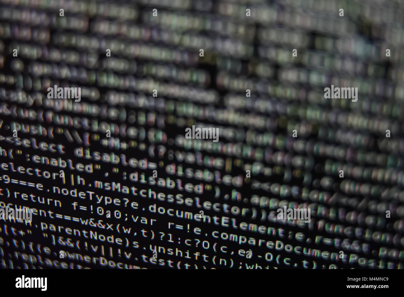 Weiß Programm Source Code-Segment auf einem schwarzen Bildschirm Closeup Stockfoto
