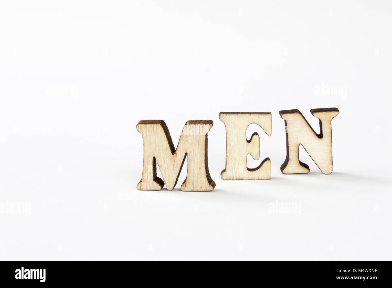 Männer, Männer Holz Buchstaben auf weißem Hintergrund Stockfoto