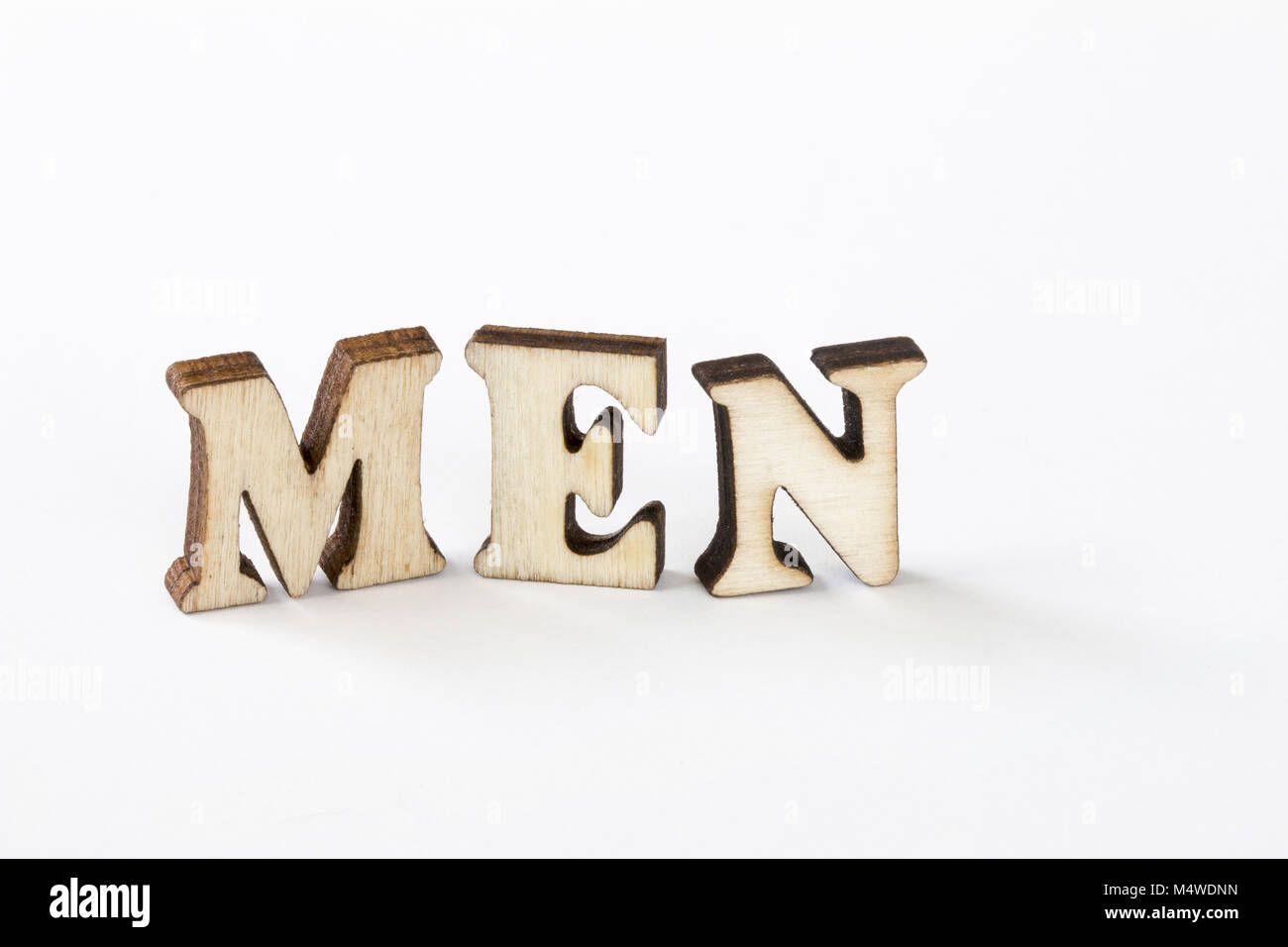 Männer, Männer Holz Buchstaben auf weißem Hintergrund Stockfoto