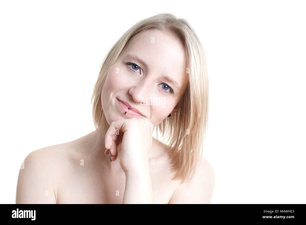 Blauäugige blonde junge Frau Stockfoto