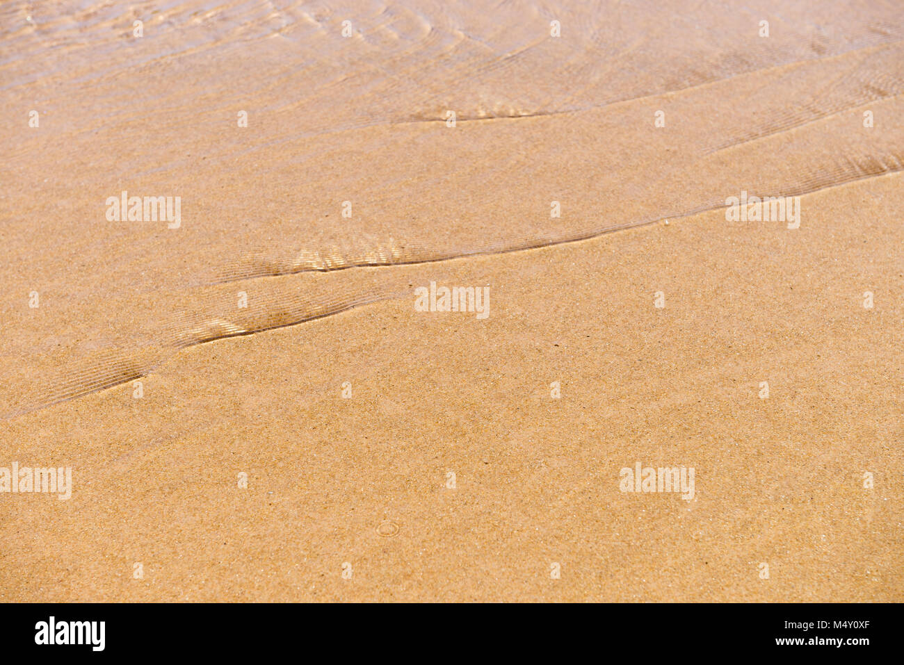 Wasser Formen und Auswirkungen alle über den Strand Stockfoto