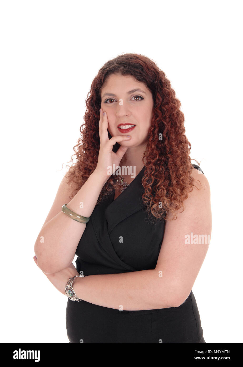 Frau denken mit ihrer Hand auf ihrem Gesicht Stockfoto