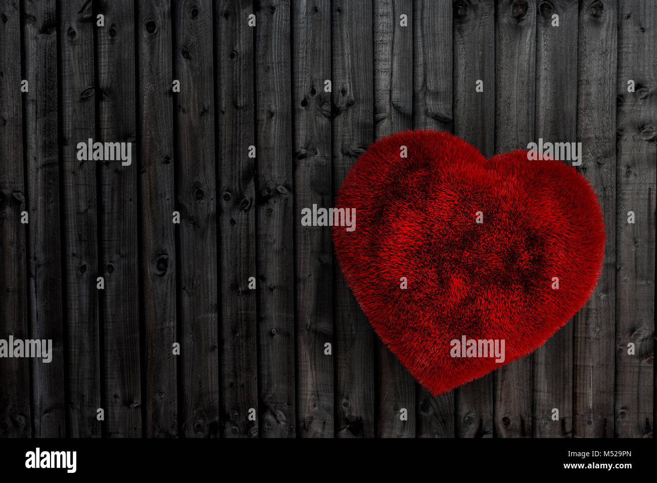 Valentine's Tag Muttertag flauschigen Herz dunklen Hintergrund Stockfoto