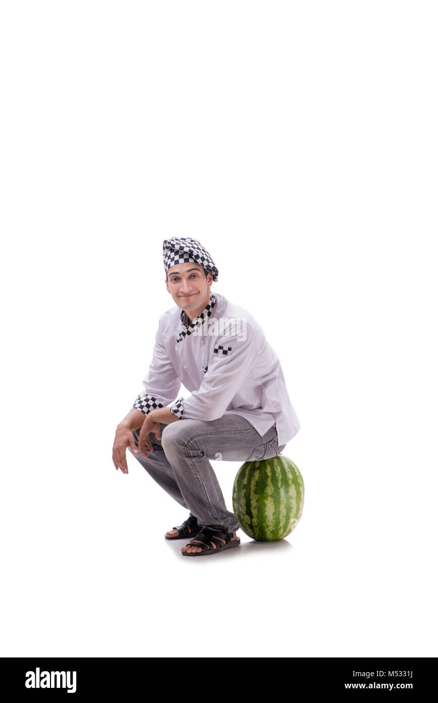 Junge männliche Kochen mit Wassermelone isoliert auf weißem Stockfoto