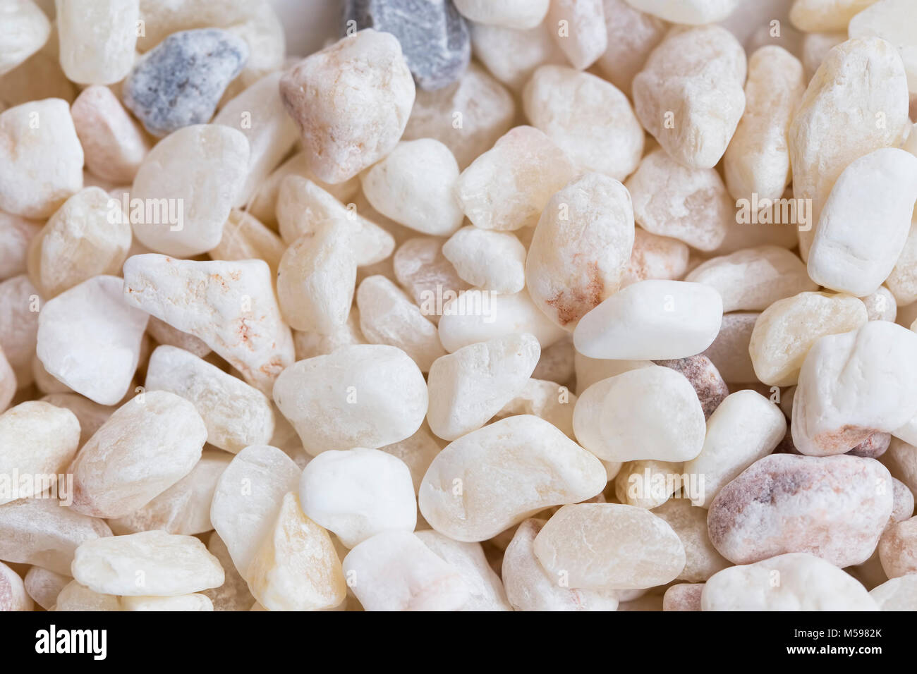 Natürliche weiße Steine Textur Hintergrund Muster Stockfoto