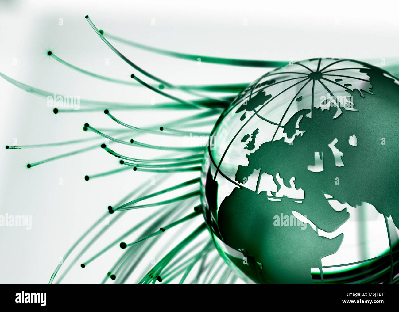 Kugel und Fiber Optics, weißer Hintergrund, grün Stockfoto