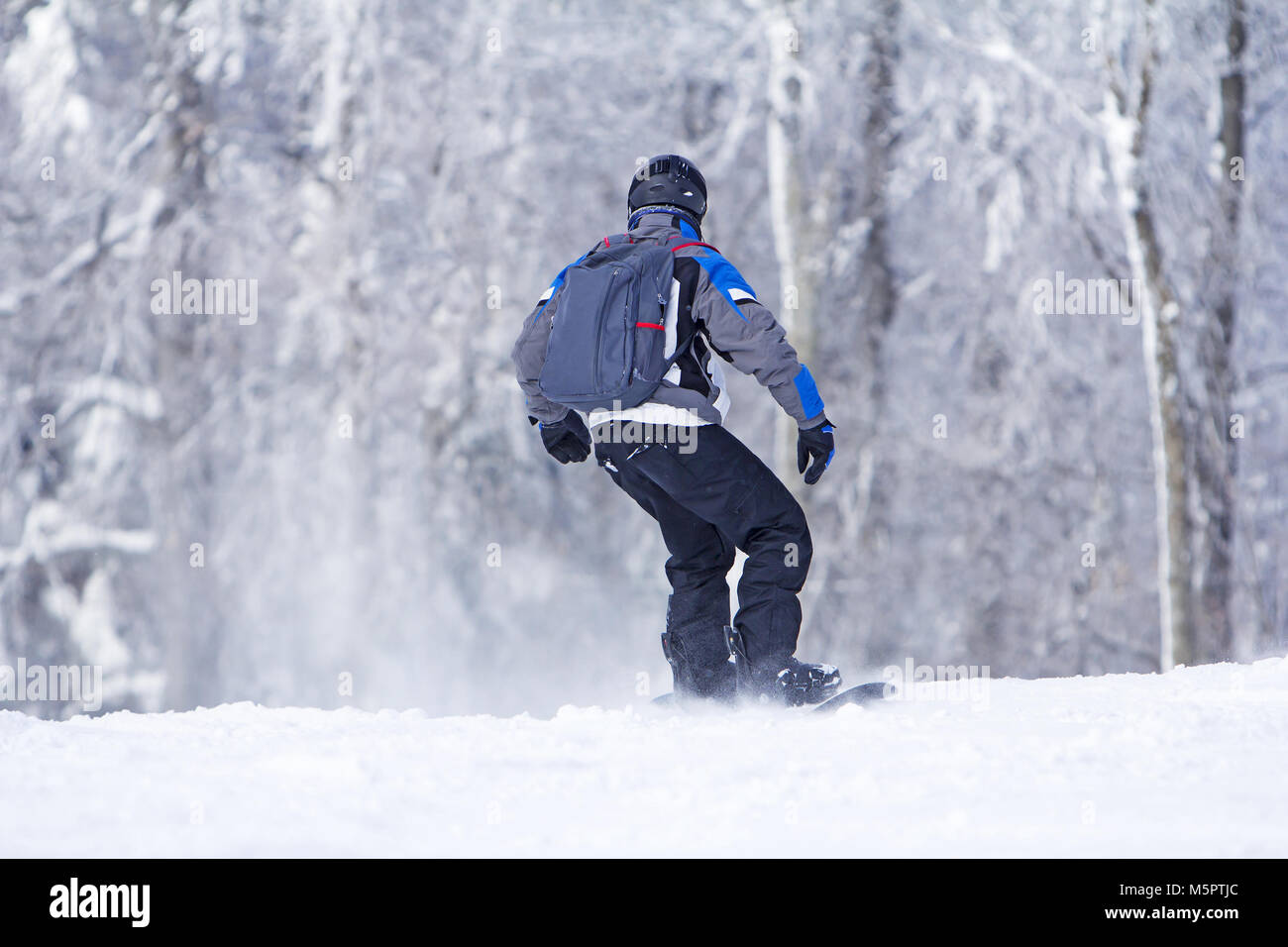 Winter Sport snowboarder am Ski slopeand Alpen Berge Landschaft Stockfoto