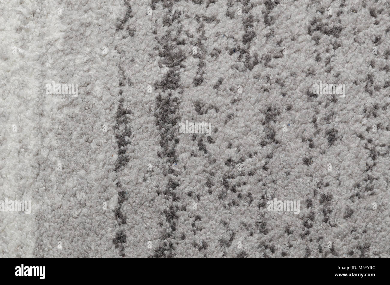 Grauer Teppich muster textur. Teppich Textur Stoff wolle Fußmatte Textil grau Konzept Stockfoto