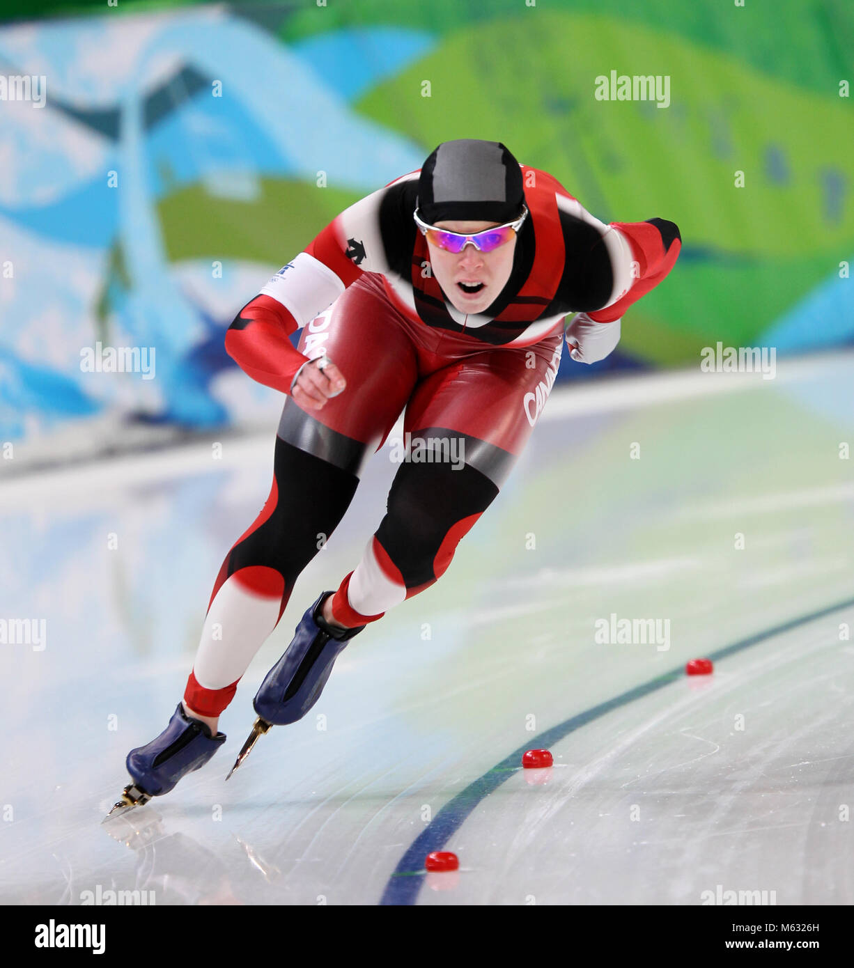 Christine Nesbitt von Kanada in Aktion in der Frauen 1000 Meter speedskating Rennen auf dem Richmond Oval während der Olympischen Spiele in Vancouver. Nesbitt gewann die Goldmedaille in der Veranstaltung. Stockfoto
