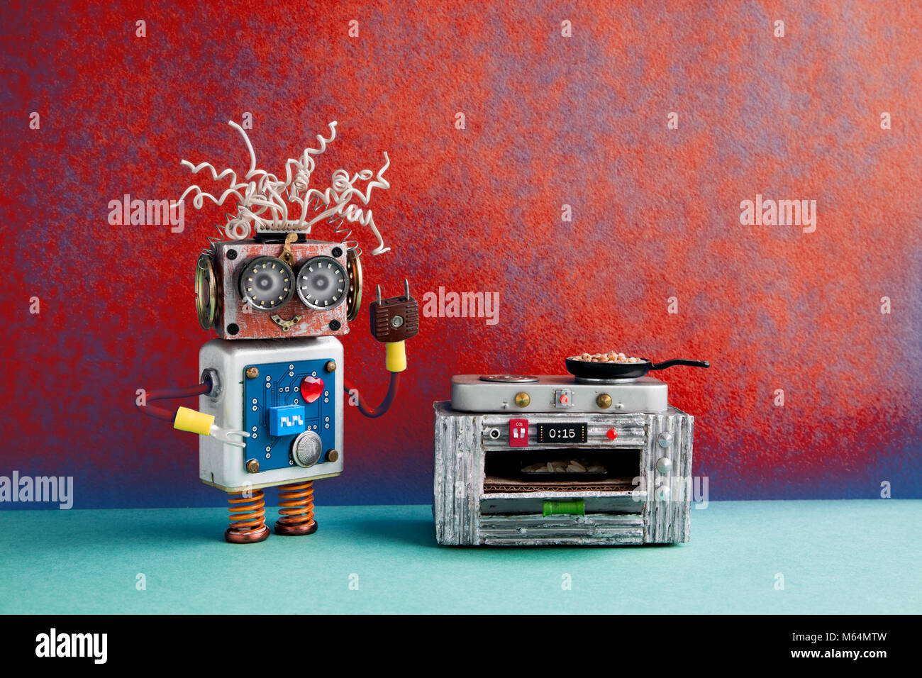 Robotic Küchenchef bereitet Mahlzeiten Bratpfanne, elektronische Herd  Backofen. Kreatives Design Roboter Spielzeug, Automation smart home  Konzept. Rot Blau, Grün, Hintergrund Stockfotografie - Alamy