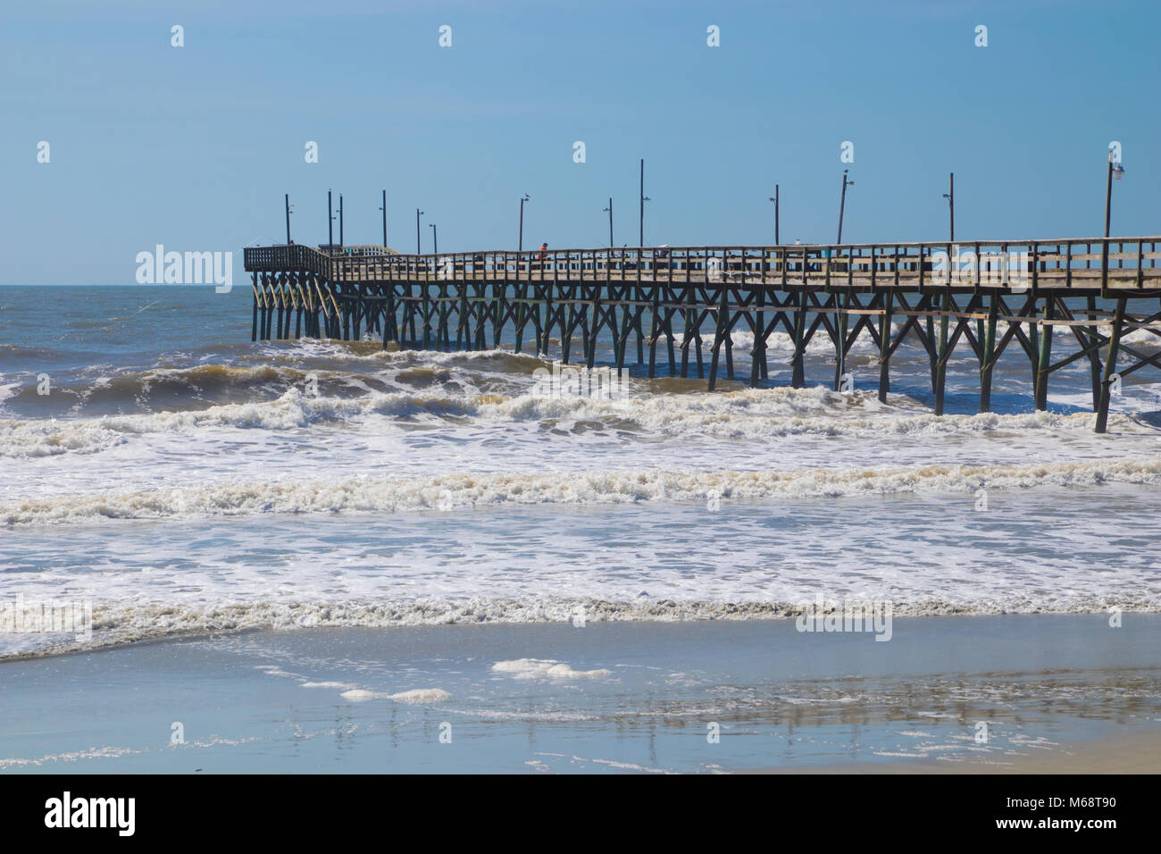 Pier am Sunset Beach, North Carolina Stockfoto