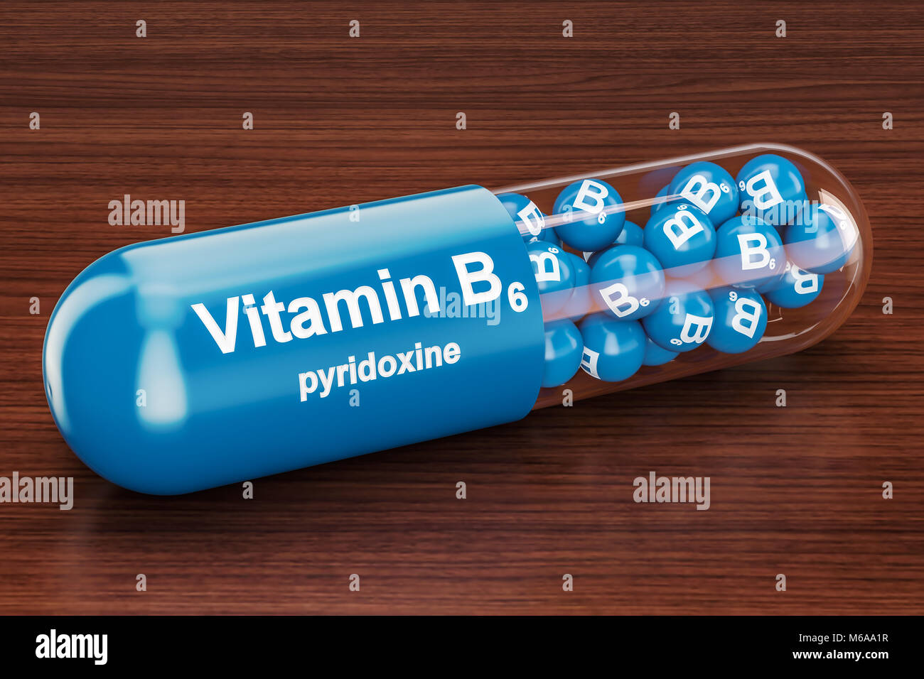 Kapsel Vitamin B6 auf dem Holztisch. 3D-Rendering Stockfoto