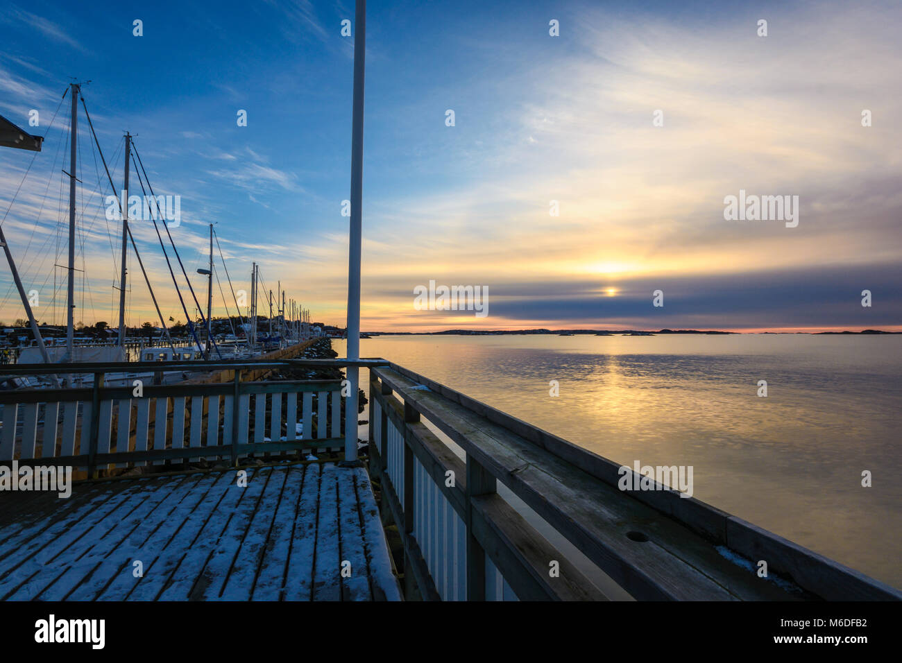 Sonnenuntergang vom Boot oder Ware House in Saltholmen, Göteborg, Schweden 2018 gesehen Stockfoto