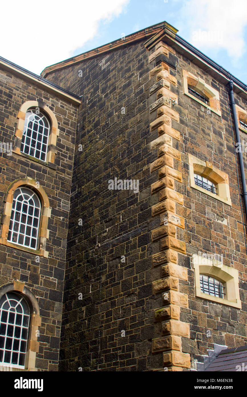Werfen Sie einen Blick hinter die Gefängnismauern in den Gefängnishof der alten Crumlin Road Gefängnis in Belfast Nordirland mit seinen imposanten viktorianischen Architektur Stockfoto
