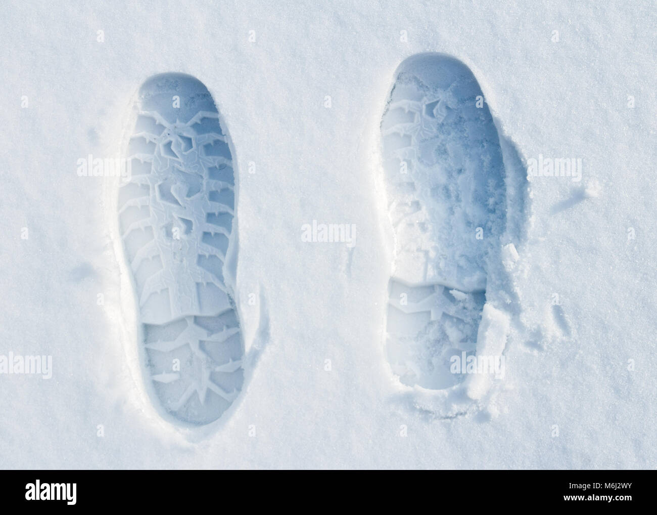 Fußabdrücke auf Schnee Stockfoto