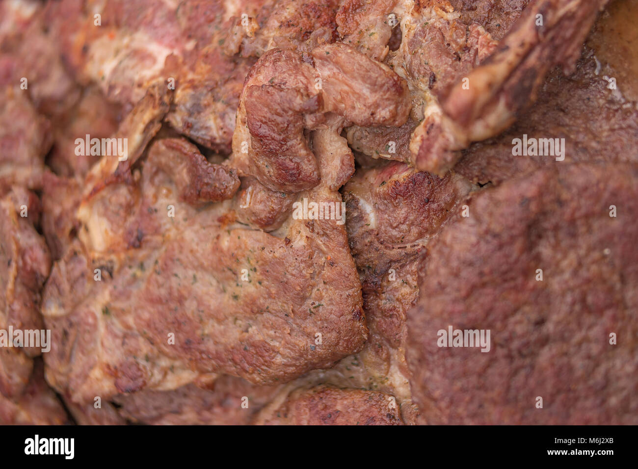 Extreme closeup Detail von gegrilltem Fleisch ohne Knochen, flacher Fokus Stockfoto