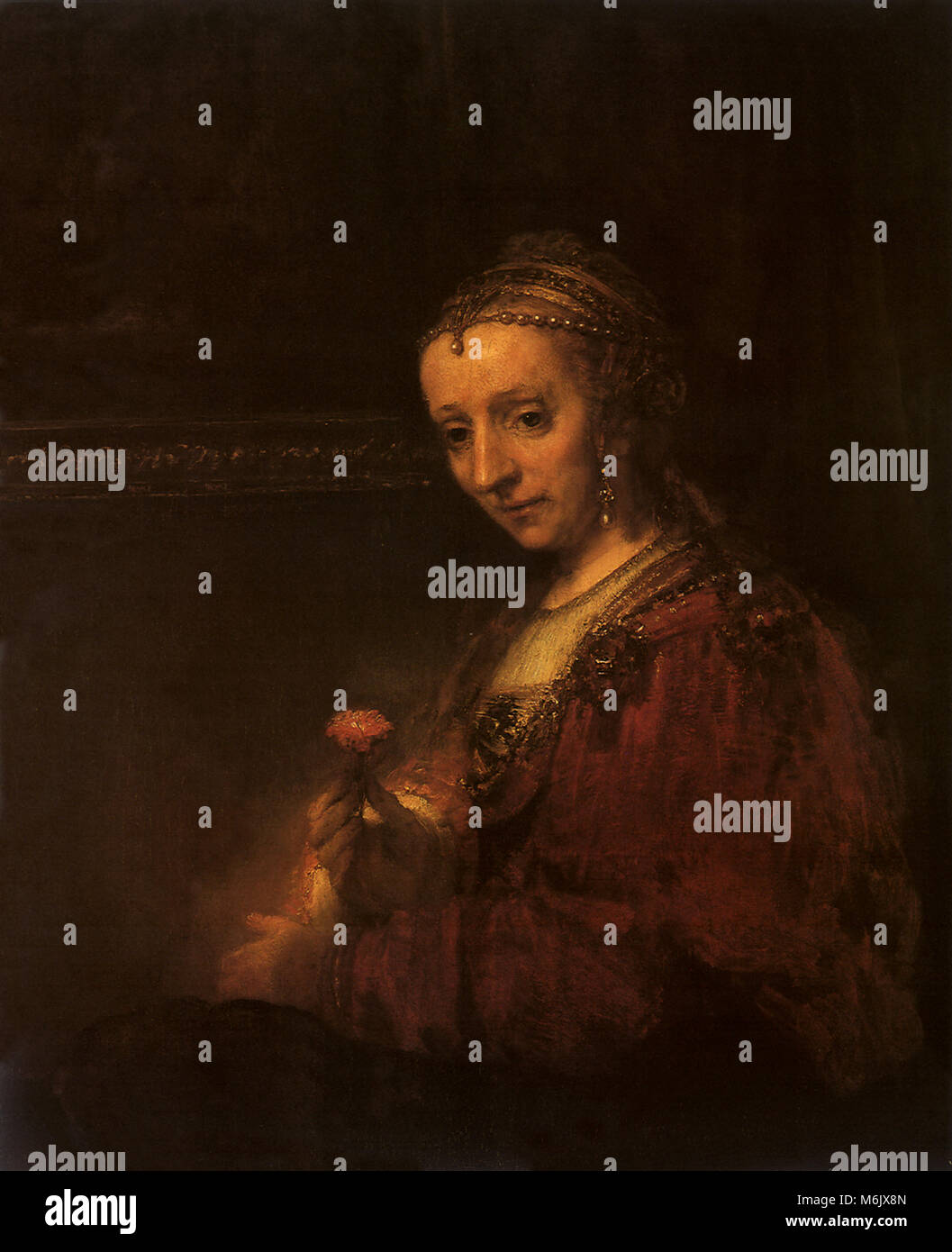 Eine Frau mit einer roten Nelke in ihrer rechten Hand, Rembrandt, Harmensz van Rijn, 1665. Stockfoto