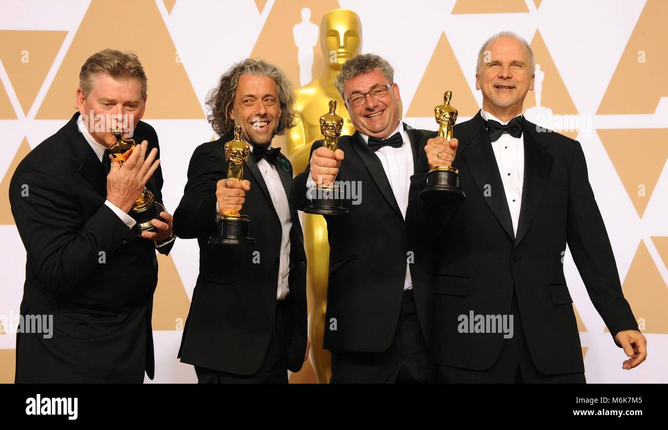 Los Angeles, CA, USA. 4 Mär, 2018. Richard R. Hoover, Paul Lambert, Gerd Nefzer, John Nelson in der Presse Raum für die 90Th Academy Awards - Presseraum, die Dolby Theater in Hollywood und Highland Center, Los Angeles, CA, 4. März 2018. Credit: Elizabeth Goodenough/Everett Collection/Alamy leben Nachrichten Stockfoto