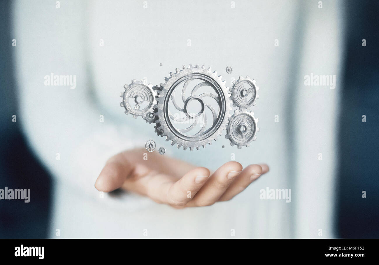 Zahnräder auf Hand, Konzept der Technologie oder Ideen Stockfoto