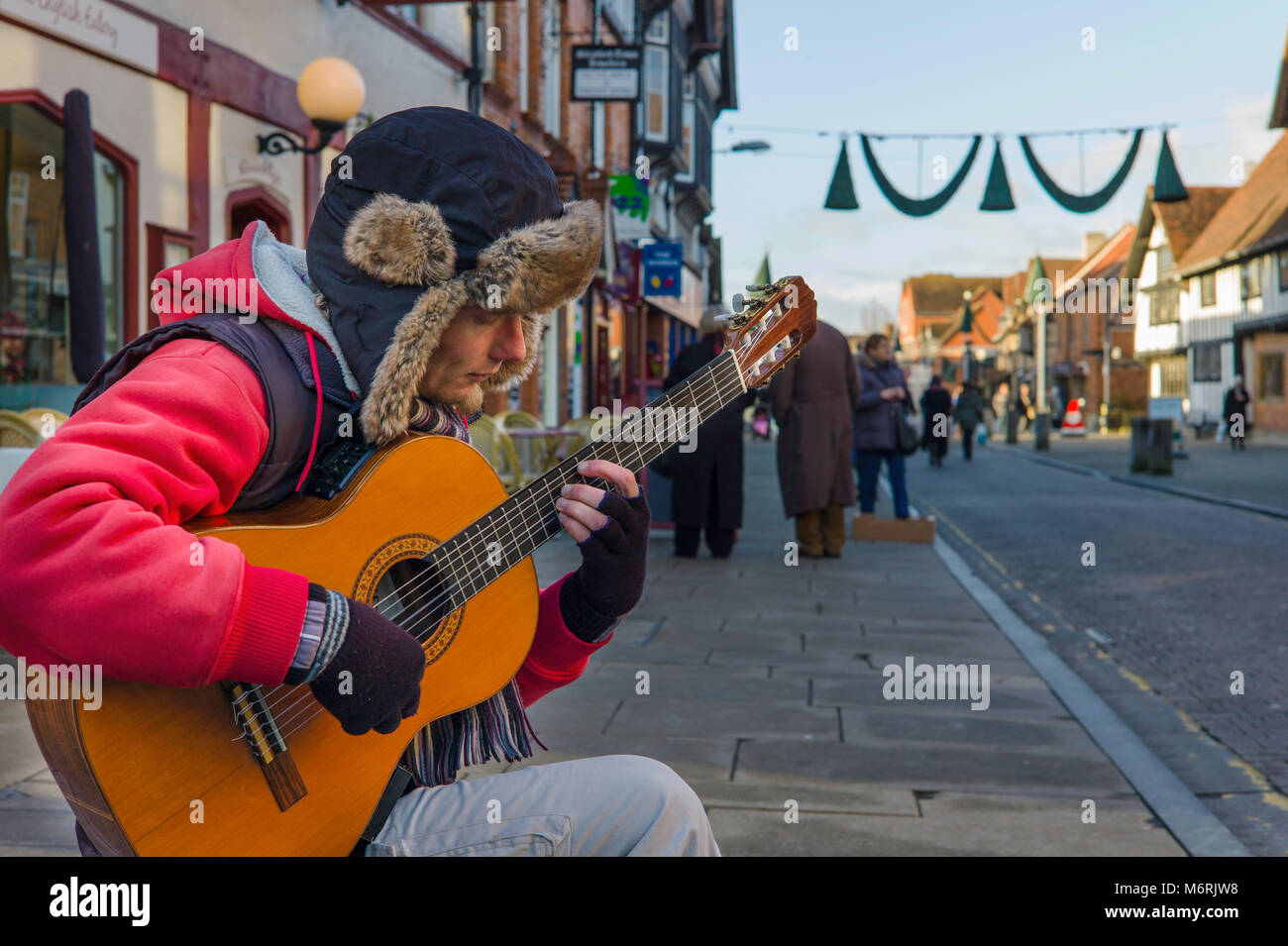 Ein Straßenmusiker klassische Gitarre in London. Stockfoto