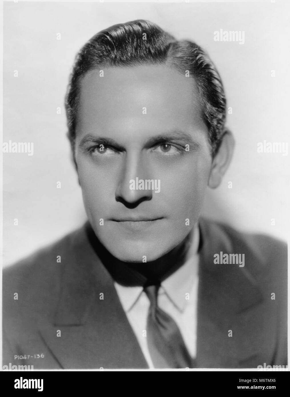 Fredric März, Kopf und Schultern Werbung Porträt, 1933 Stockfoto