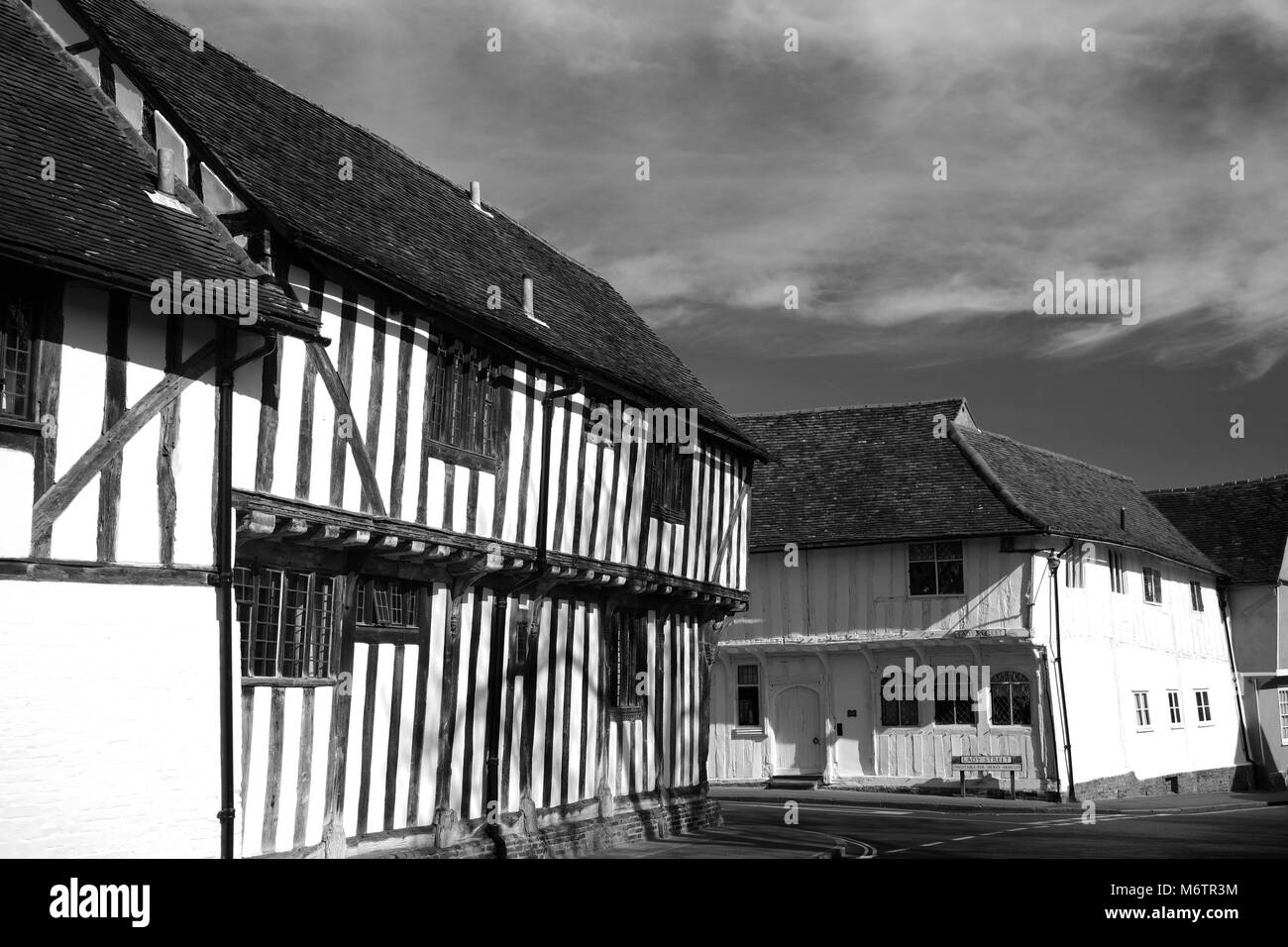 Bunte Fachwerk gerahmt strohgedeckten Hütten, Lavenham Dorf, Suffolk County, England, Großbritannien Stockfoto