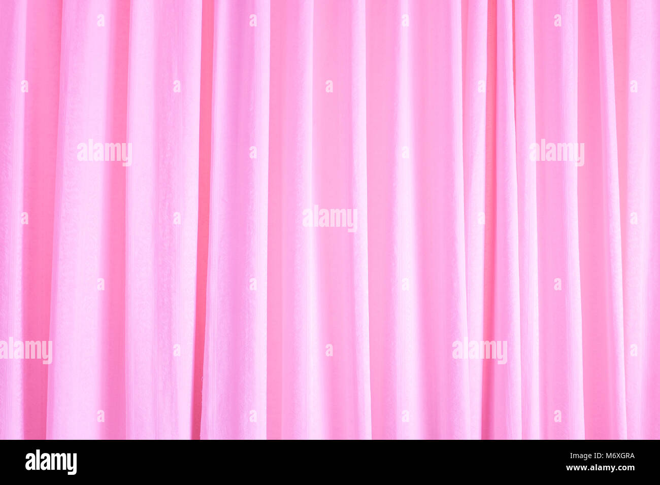 Rosa Vorhang Textur als Hintergrund Stockfoto