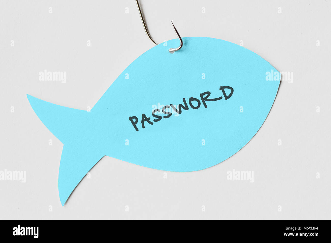 Kennwort auf einem Papier Hinweis in Form eines Fisches zu einem Haken geschrieben - Phishing und Internet Security Konzept Stockfoto