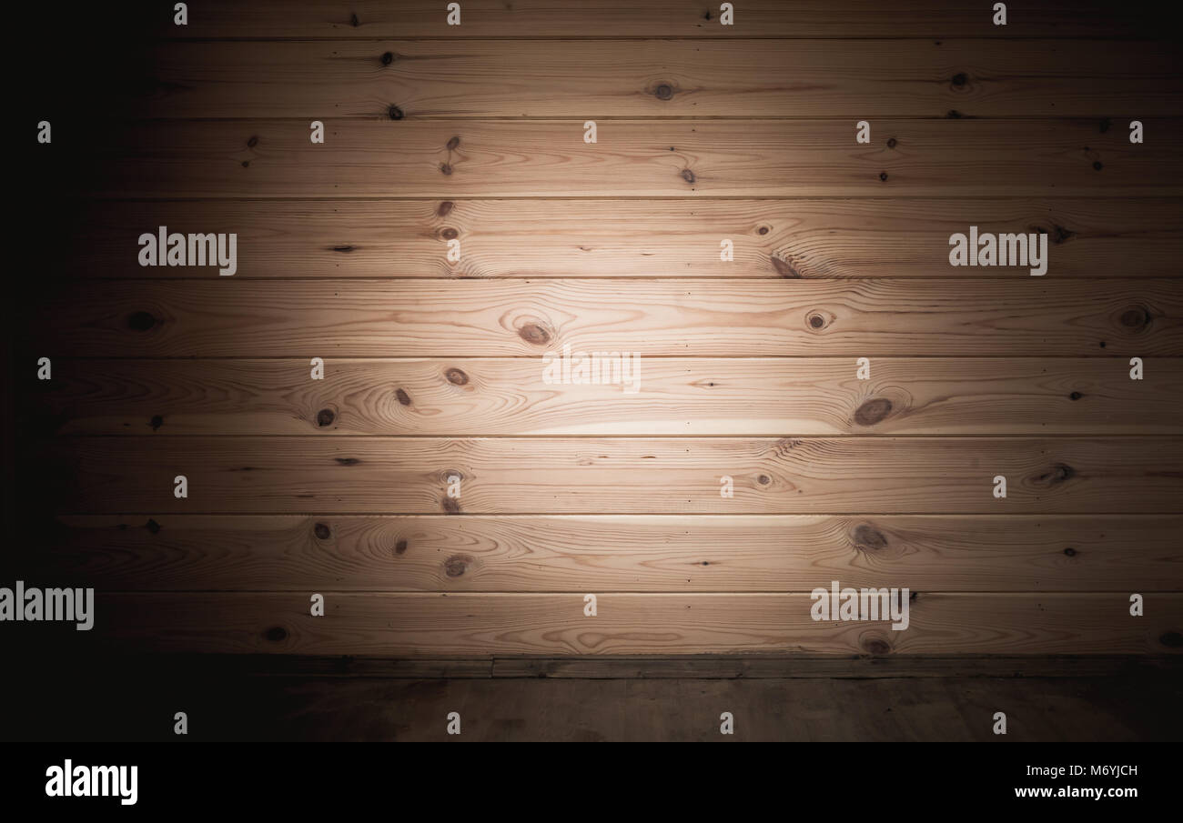 Holz- Wand- und Hintergrund. Leeren dunklen Innenraum, frontale Ansicht mit Vignettierung Schatteneffekt Stockfoto