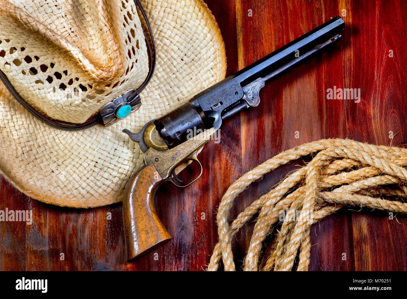 Alte cowboy Pistole, Strohhut und Seil. Stockfoto