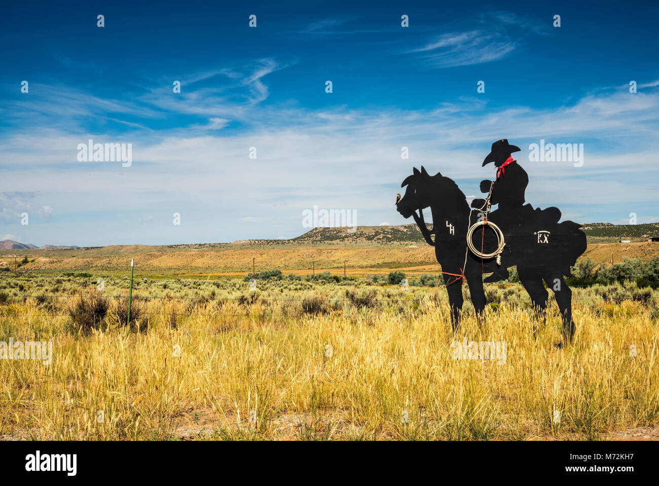 Cowboy silhouette Metall Aussparung an der Ranch in Yampa River Valley, in der Nähe von Maybell, Colorado, USA Stockfoto