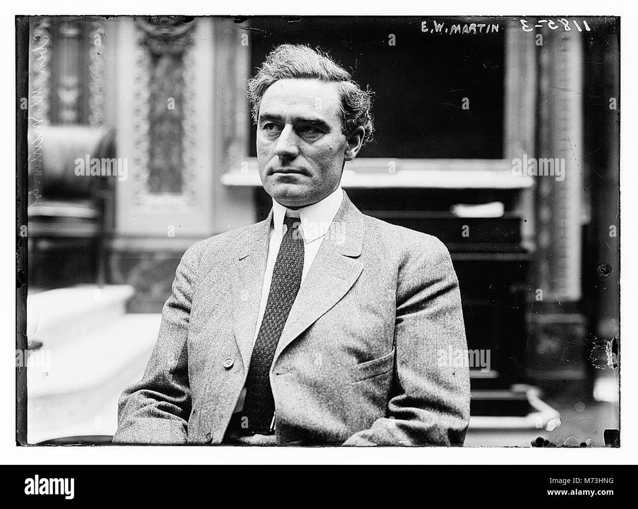 E. W. Martin war eine bedeutende Persönlichkeit, bekannt für seine Beiträge zur amerikanischen Wirtschaft und Industrie. Dieses historische Bild spiegelt seine Rolle bei der Gestaltung der Geschäftslandschaft seiner Zeit wider. Stockfoto