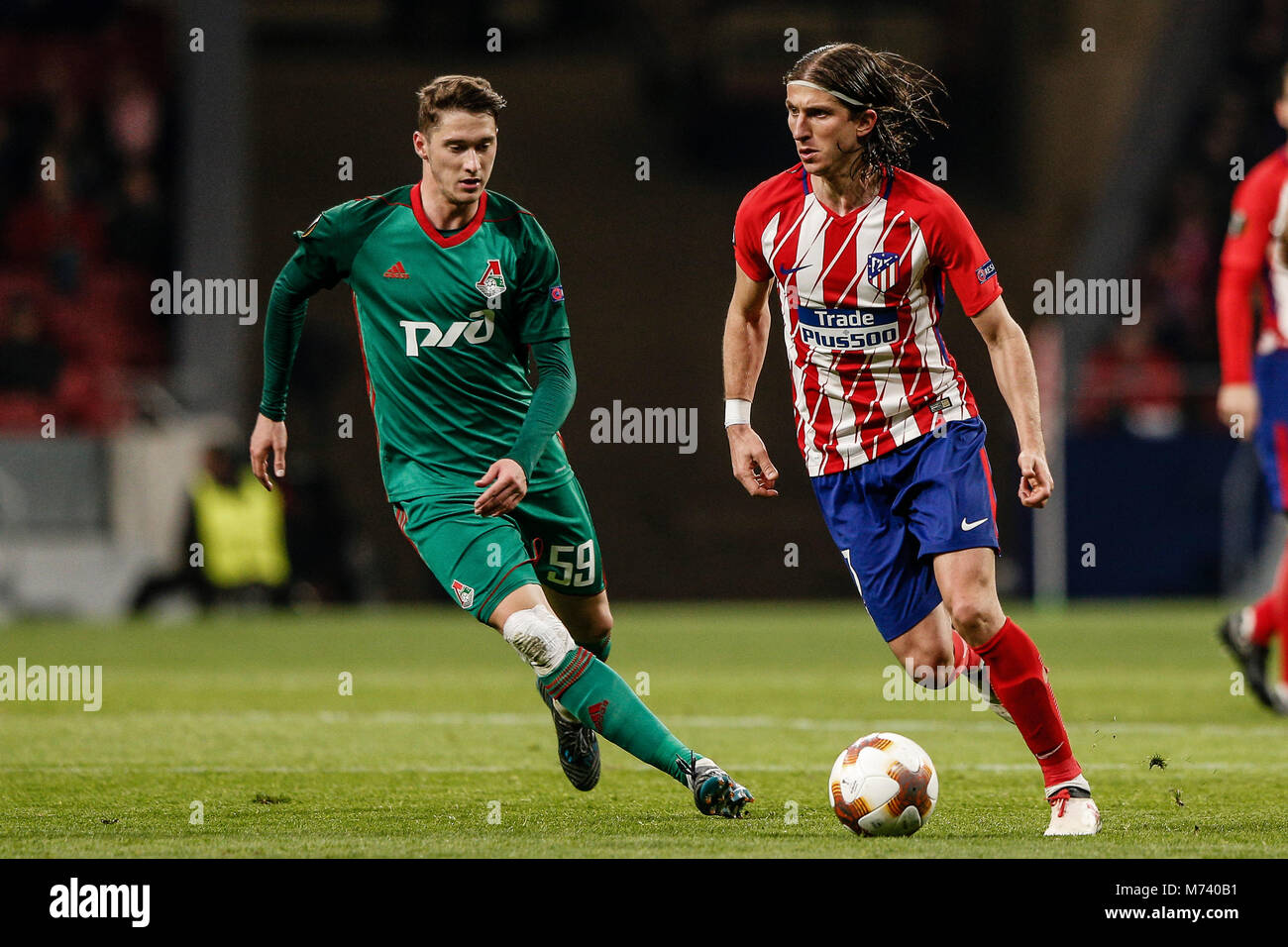 Madrid, Spanien. 8 Mär, 2018. Filipe Luis Kasmirski (Atletico de Madrid) antreibt, auf der Kugel Aleksey Miranchuk (Lokomotiv Moscu), UEFA Europa League Spiel zwischen Atlético de Madrid vs Lokomotiv Moscu am Wanda Metropolitano Stadion in Madrid, Spanien, 8. März 2018. Credit: Gtres Información más Comuniación auf Linie, S.L./Alamy leben Nachrichten Stockfoto