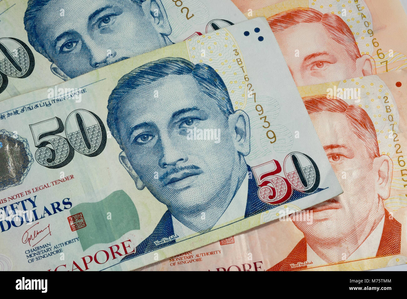 50 und 10 Singapur Dollar Bills Textur als Hintergrund Stockfoto