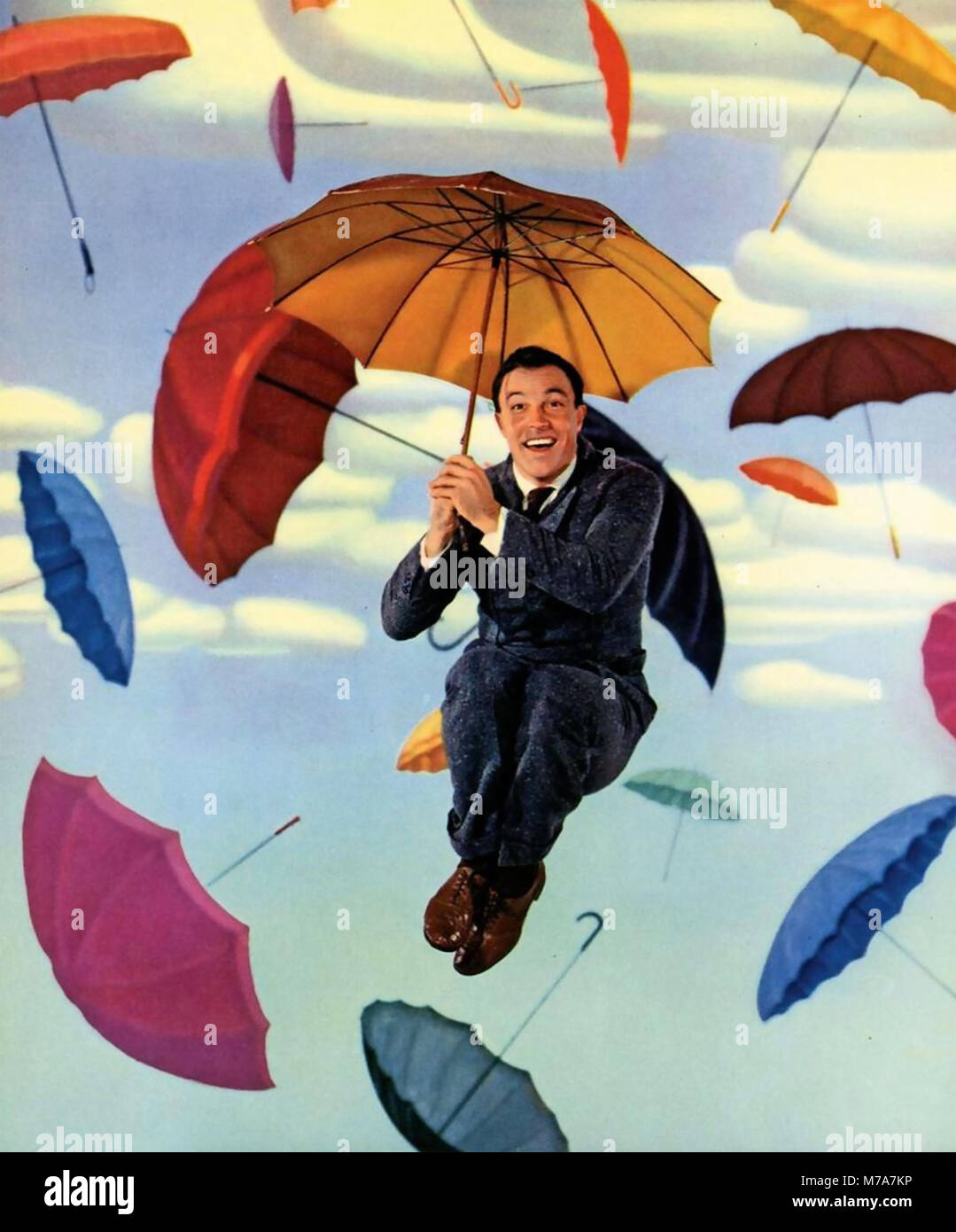 GENE KELLY (1912-1996) US-amerikanischer Sänger, Tänzer und Schauspieler in einem Werbefoto für seine 1952 Film ingin' in the Rain' Stockfoto