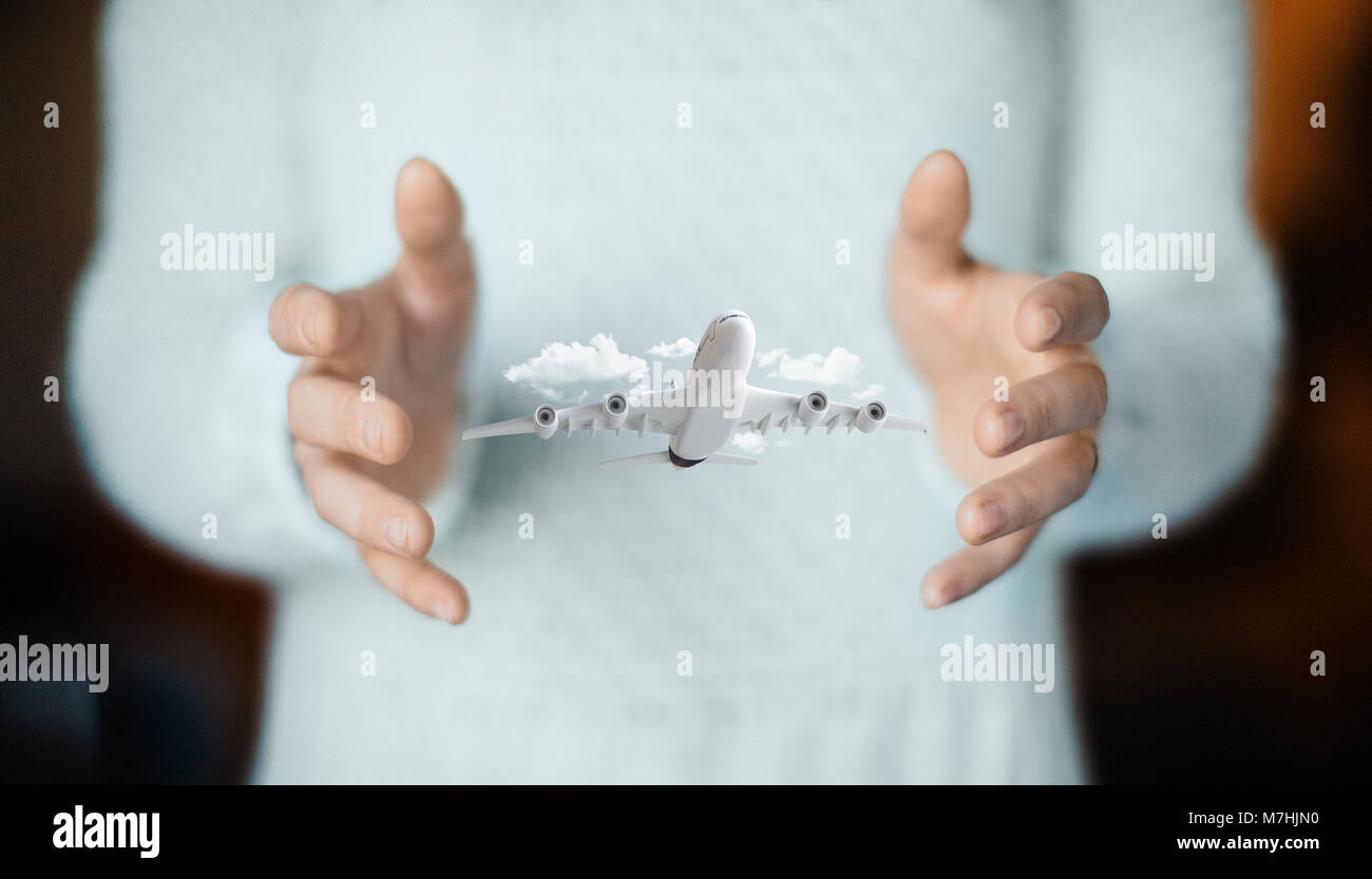 Flugzeug auf Hand, Konzept der Urlaub oder Business arbeiten Stockfoto