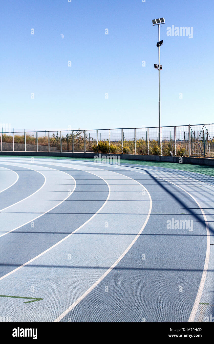 Hintergrundbild von blue Running tracks auf einem laufenden Stromkreis Stockfoto