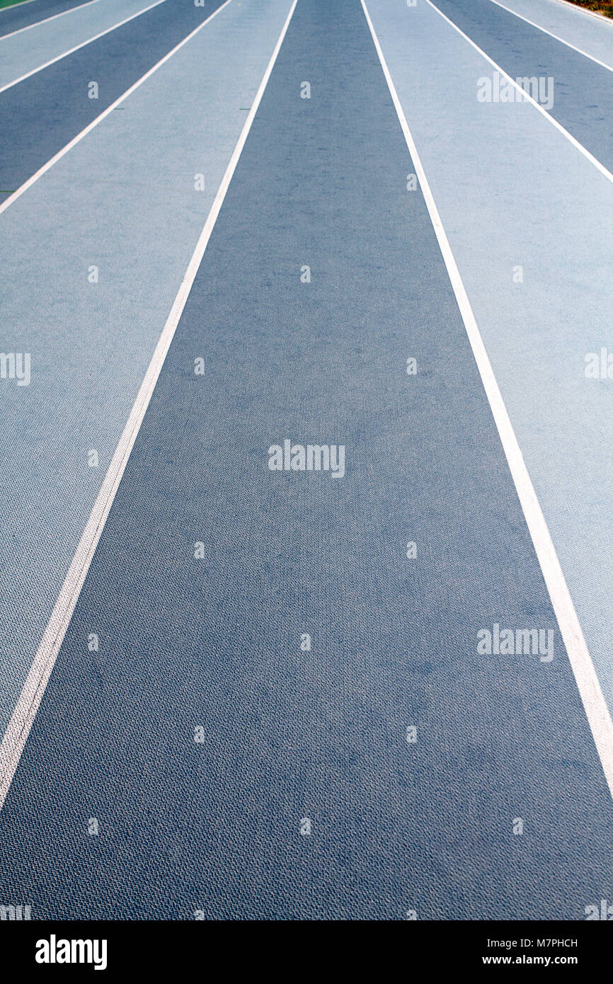 Hintergrundbild von blue Running tracks auf einem laufenden Stromkreis Stockfoto