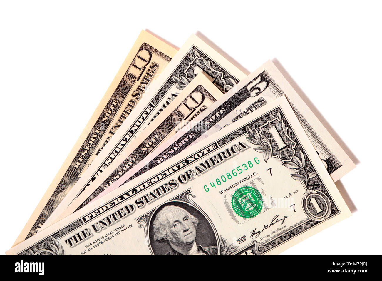 Ungepflegte fan von verschiedenen US-Dollarnoten gegen Weiße isoliert. Stockfoto