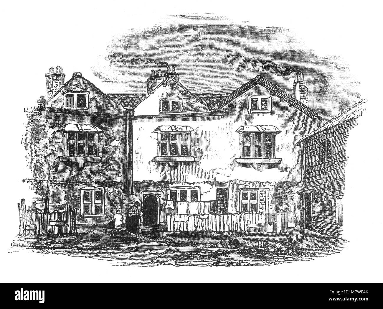 Die Überreste der aus dem 11. Jahrhundert Bermondsey Abbey, ein englischer Benediktiner Kloster aus dem 19. Jahrhundert. Häuser in der Nähe auf dem Grange Spaziergang integriert einige Überreste der Abtei. Es ist jetzt Bermondsey Square, dem Ort der Bermondsey Markt, Bermondsey, im Londoner Stadtteil Southwark, England. Stockfoto