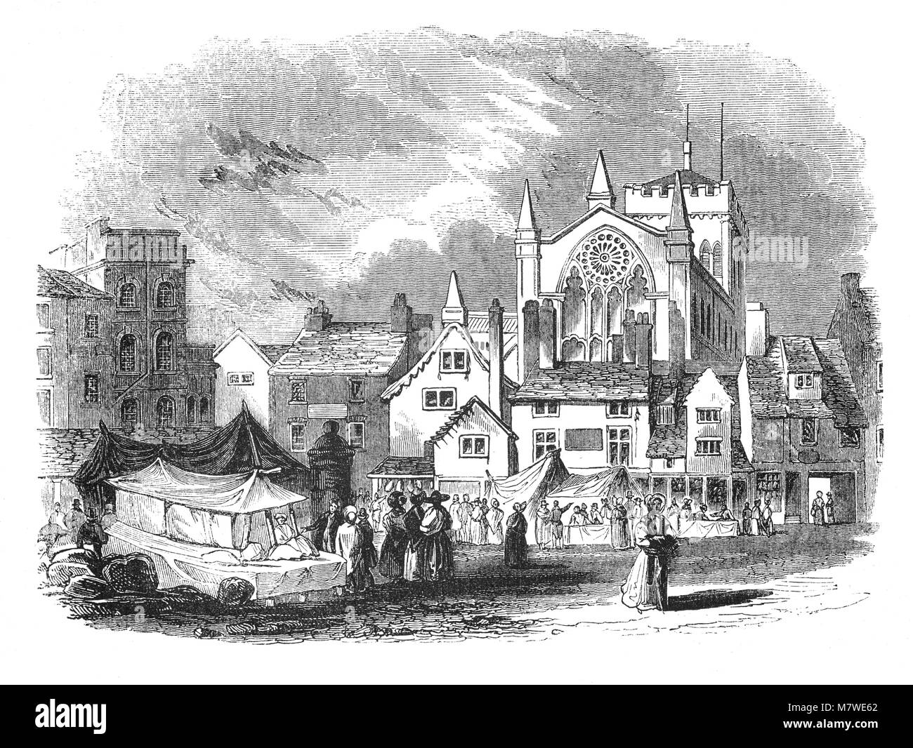 Ein Markt vor der Hexham Priorat. Ursprünglich in der Nähe von Hexham, Northumberland eine Abtei zu St Andrew gewidmet, im Nordosten Englands. Ursprünglich in AD 674 gebaut, die Abtei wurde im normannischen Zeiten während des 12. Jahrhunderts, wenn Wilfrid's Abtei wurde ersetzt durch ein Augustiner Kloster gebaut. Die heutige Kirche stammt größtenteils aus C 1170-1250, in den frühen englischen Stil der Architektur gebaut. Stockfoto