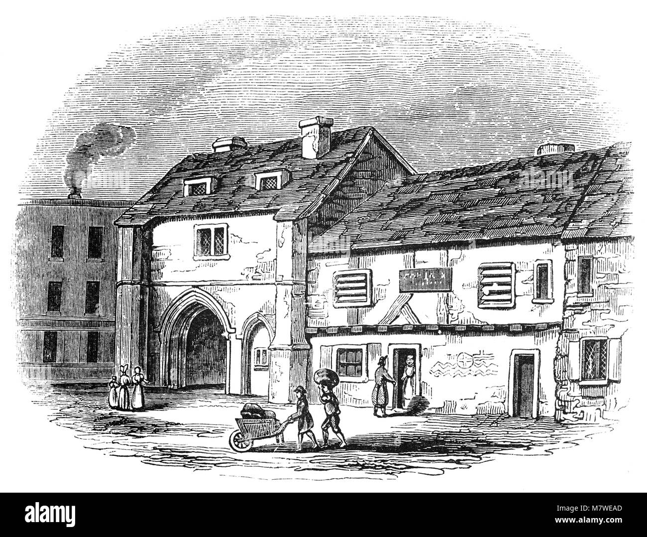 Die Überreste der aus dem 11. Jahrhundert Bermondsey Abbey, ein englischer Benediktiner Kloster aus dem 19. Jahrhundert. Häuser in der Nähe auf dem Grange Spaziergang integriert einige Überreste der Abtei. Es ist jetzt Bermondsey Square, dem Ort der Bermondsey Markt, Bermondsey, im Londoner Stadtteil Southwark, England. Stockfoto